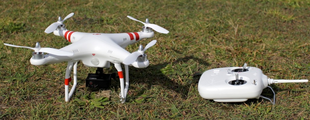 DJI Phantom with remote and attached GoPro